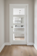 White Shaker 4-Light Door Looking Into Kitchen