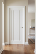 White three-panel door in modern interior